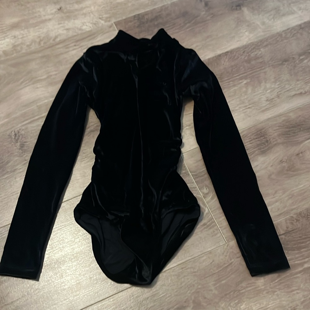 Black Velvet Leotard with Red stones on back and hair piece.